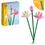 Product LEGO® Botanical Collection: Lotus Flowers (40647) Along with an Easter Candle image
