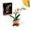 Product LEGO® Botanical Collection: Mini Orchid (10343) Along with an Easter Candle image