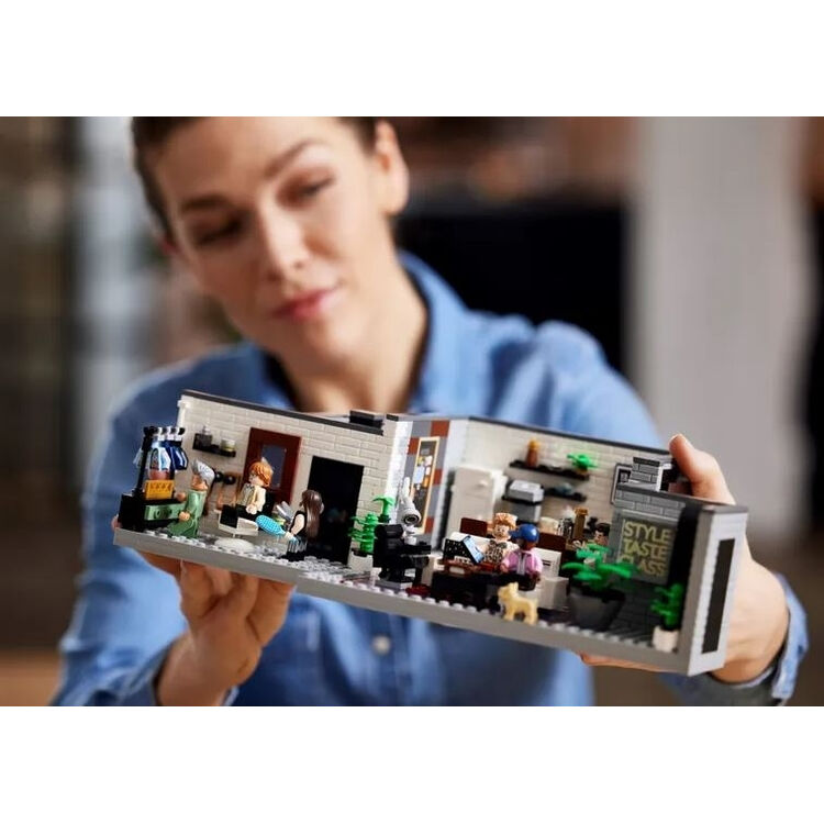 Product LEGO® Icons: Queer Eye - The Fab 5 Loft (10291) Along with an Easter Candle image