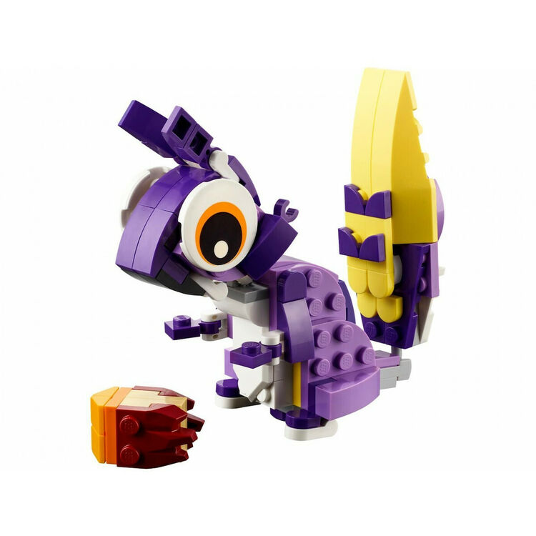Product LEGO® Creator: Fantasy Forest Creatures (31125) Along with an Easter Candle image