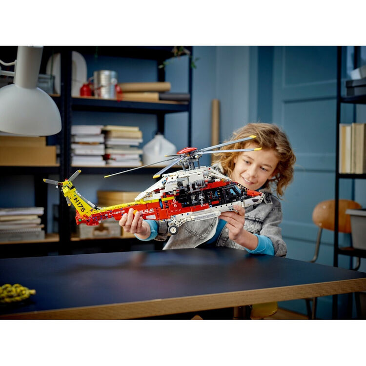 Product LEGO® Technic: Airbus H175 Rescue Helicopter (42145) Along with an Easter Candle image