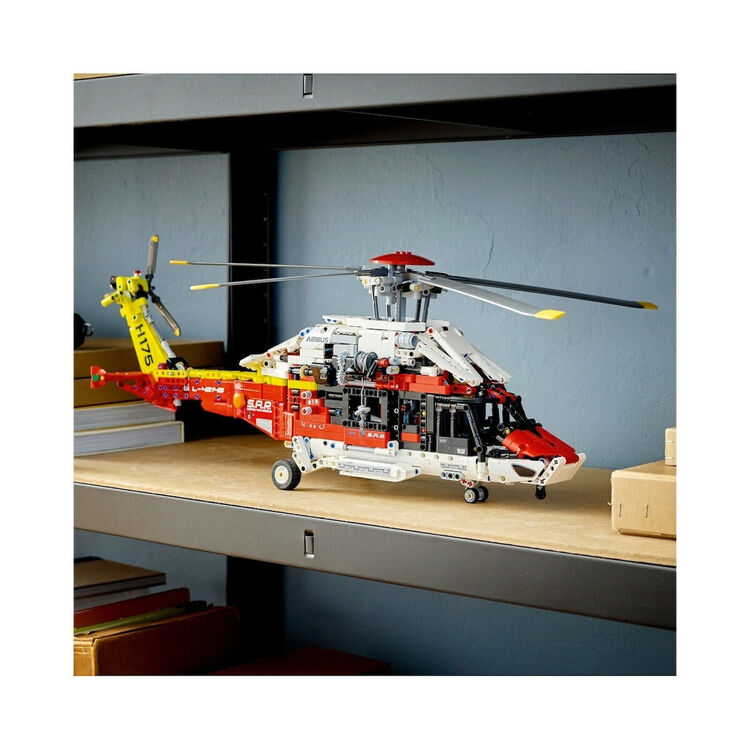 Product LEGO® Technic: Airbus H175 Rescue Helicopter (42145) Along with an Easter Candle image