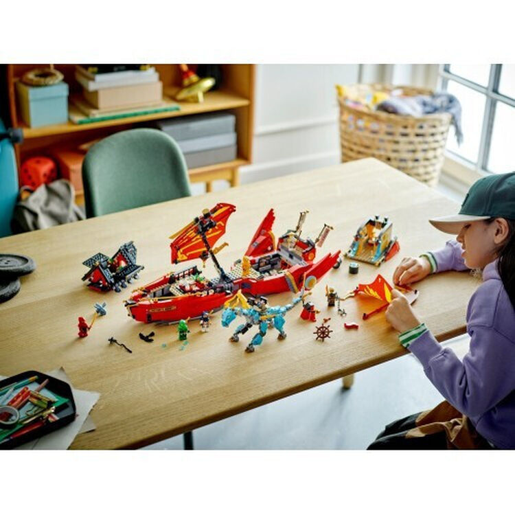 Product LEGO® NINJAGO®: Destiny’s Bounty – race against time (71797) Along with an Easter Candle image